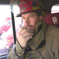 Captain Doug Mummert with a Saber Radio